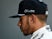 Lewis Hamilton stands in the paddock during a press conference at the Circuit de Catalunya on February 25, 2016