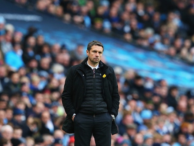 Remi Garde cuts a miserable figure during the Premier League game between Manchester City and Aston Villa on March 5, 2016