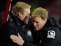 Ronald Koeman and Eddie Howe greet each other during the Premier League game between Bournemouth and Southampton on March 1, 2016