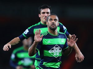 Wayne Routledge of Swansea City celebrates scoring the equalising goal against Arsenal on March 2, 2016