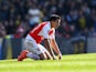 Alexis Sanchez takes a breather during the FA Cup game between Arsenal and Watford on March 13, 2016