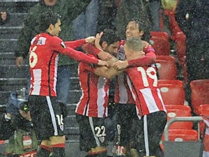 Athletic players celebrate after scoring during the Europa League game between Athletic Bilbao and Valencia on March 10, 2016
