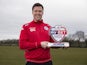 Gary Caldwell poses with his manager of the month award for February 2016