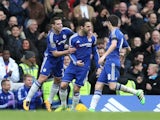 Cesc Fabregas celebrates the equaliser during the Premier League game between Chelsea and West Ham United on March 19, 2016