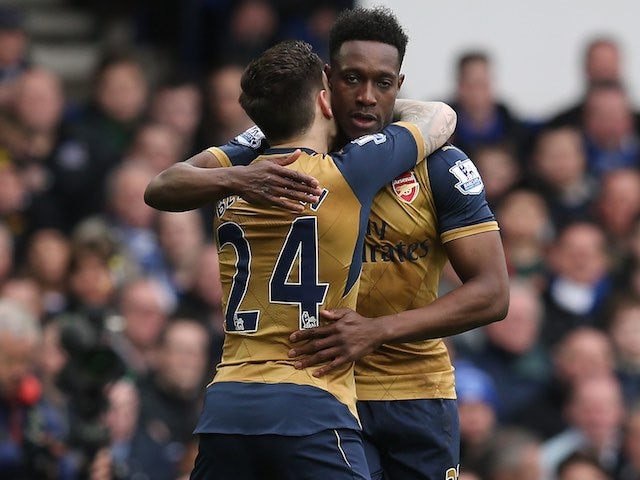 Danny Welbeck celebrates scoring the opener with Hector Bellerin during the Premier League game between Everton and Arsenal on March 19, 2016