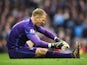 Manchester City goalkeeper Joe Hart stays down injured during the Manchester derby on March 20, 2016