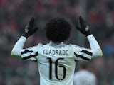 Juan Cuadrado celebrates scoring the second goal during the Champions League round-of-16 second leg between Bayern Munich and Juventus on March 16, 2016