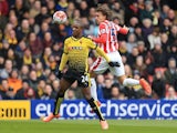 Odion Ighalo and Marc Muniesa in action during the Premier League match between Watford and Stoke City on March 19, 2016