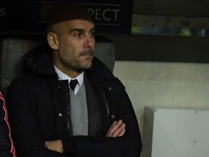 Pep Guardiola follows the game during the Champions League round-of-16 second leg between Bayern Munich and Juventus on March 16, 2016
