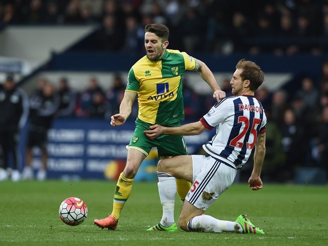 Robbie Brady and Craig Dawson in action during the Premier League match between West Bromwich Albion and Norwich City on March 19, 2016