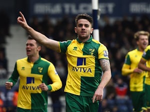 Norwich climb out of relegation zone