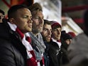 Robbie Savage watches an Accrington Stanley match on March 16, 2016