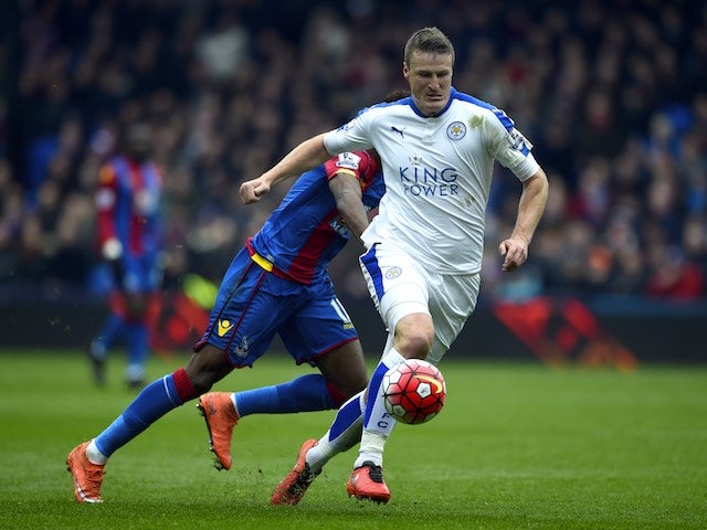 Robert Huth and Wilfried Zaha in action during the Premier League game between Crystal Palace and Leicester City on March 19, 2016
