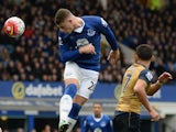 Ross Barkley wins a header during the Premier League game between Everton and Arsenal on March 19, 2016