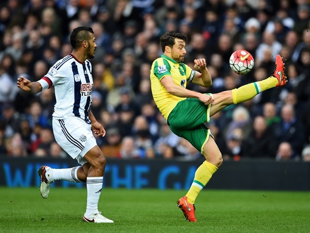 Russell Martin and Salomon Rondon during the Premier League match between West Bromwich Albion and Norwich City on March 19, 2016