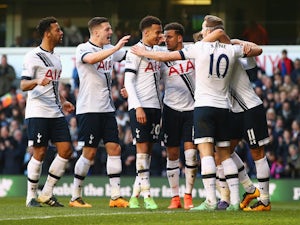 Tottenham Hotspur players celebrate a goal by Harry Kane against Bournemouth on March 20, 2016