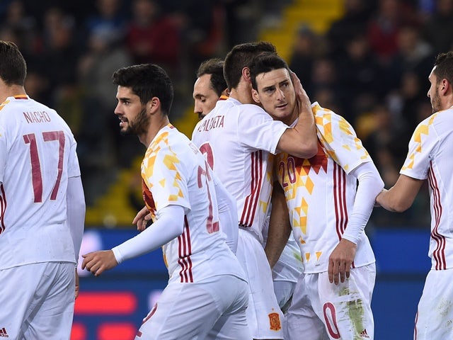 Aritz Aduriz of Spain celebrates a goal with teammates during the international friendly against Italy on March 24, 2016