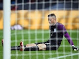 Jack Butland sits injured during the international friendly between Germany and England on March 26, 2016