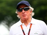 Sir Jackie Stewart walks in the paddock during previews to the Formula 1 Grand Prix of Singapore at Marina Bay Street Circuit on September 17, 2015