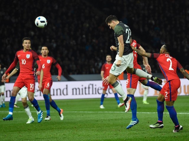 Mario Gomez heads in his side's second during the international friendly between Germany and England on March 26, 2016