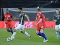 Sami Khedira and Eric Dier in action during the international friendly between Germany and England on March 26, 2016