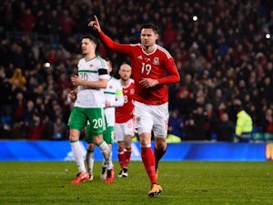 Late penalty earns Wales a draw