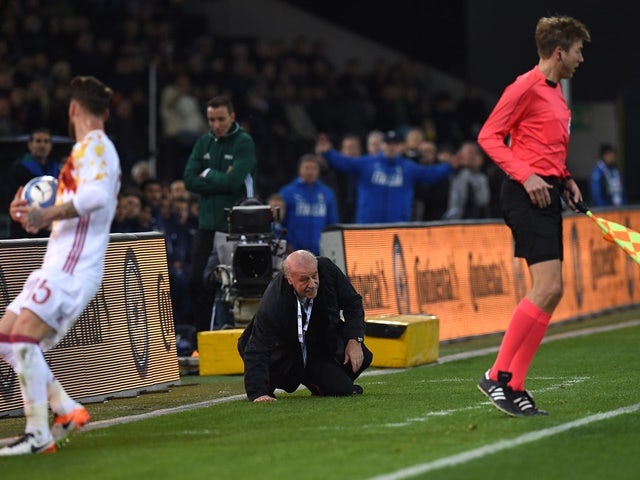 Vicente del Bosque is grounded after a clash with the assistant referee during the friendly between Spain and Italy on March 24, 2016