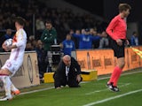 Vicente del Bosque is grounded after a clash with the assistant referee during the friendly between Spain and Italy on March 24, 2016