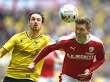 Danny Hylton and Alfie Mawson in action during the League Trophy final between Oxford United and Barnsley on April 3, 2016