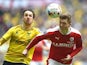 Danny Hylton and Alfie Mawson in action during the League Trophy final between Oxford United and Barnsley on April 3, 2016