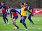 Jamie Vardy and Adam Lallana in action during an England training session on March 28, 2016