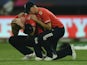 Joe Root consoles Ben Stokes after the World Twenty20 final between England and the West Indies at Eden Gardens on April 3, 2016