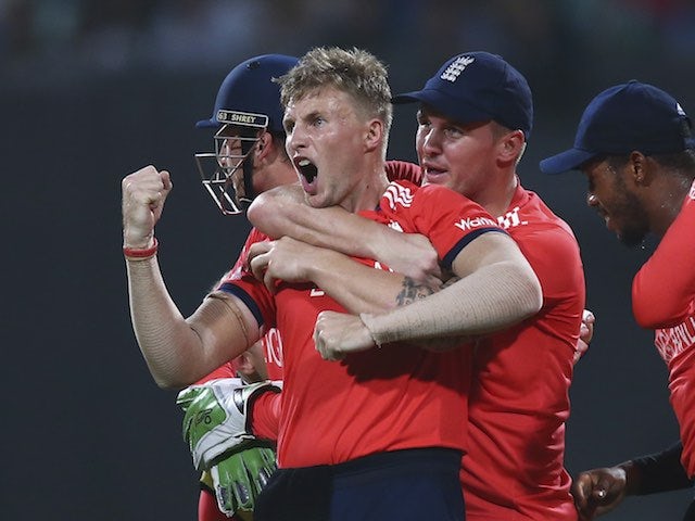 Little Joe Root celebrates taking the wicket of Chris Gayle during the World Twenty20 final between England and the West Indies at Eden Gardens on April 3, 2016