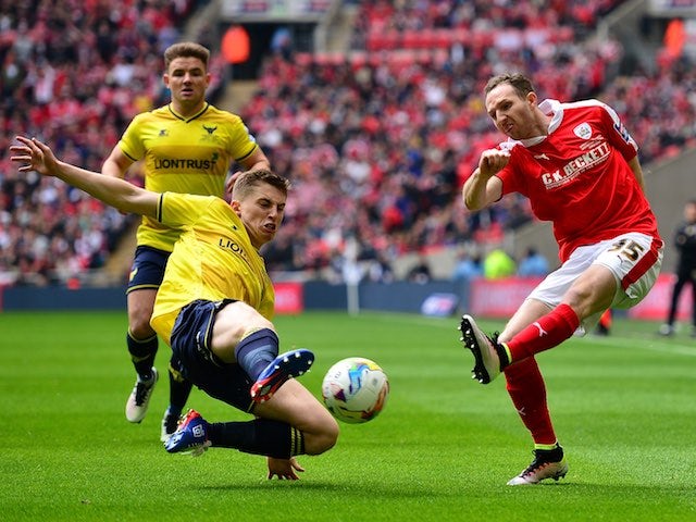 Jonjoe Kenny and Aidan White in action during the League Trophy final between Oxford United and Barnsley on April 3, 2016