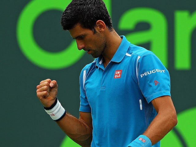 Novak Djokovic celebrates a point during the Miami Open final on April 3, 2016