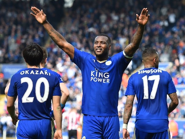 Wes Morgan celebrates scoring the opener during the Premier League match between Leicester City and Southampton on April 3, 2016