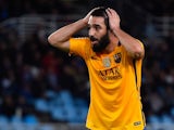 Arda Turan reacts to a missed chance during the La Liga game between Real Sociedad and Barcelona on April 9, 2016