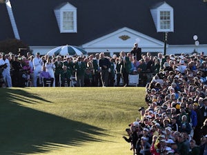 Sun rises at Augusta on the first day of The Masters on April 7, 2016