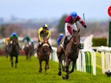 David Mullins rides Rule The World during the Grand National on April 9, 2016