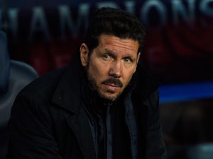 Atletico ease into last eight of CL