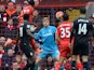 Divock Origi heads past Jakob Haugaard for the third during the Premier League game between Liverpool and Stoke City on April 10, 2016