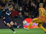 Fernando Torres and Javier Mascherano in actione during the Champions League quarter-final between Barcelona and Atletico Madrid on April 5, 2016