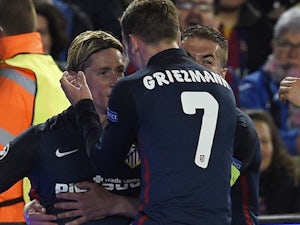 A photographer takes an awful picture of Fernando Torres celebrating his goal during the Champions League quarter-final between Barcelona and Atletico Madrid on April 5, 2016