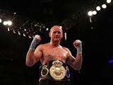 George Groves celebrates defeating David Brophy at The O2 on April 9, 2016