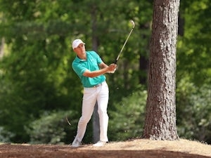 Spieth leads Masters, McIlroy four shots behind