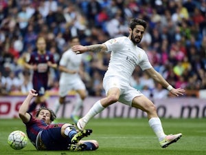 Jota Peleteiro and Isco in action during the La Liga game between Real Madrid and Eibar on April 9, 2016