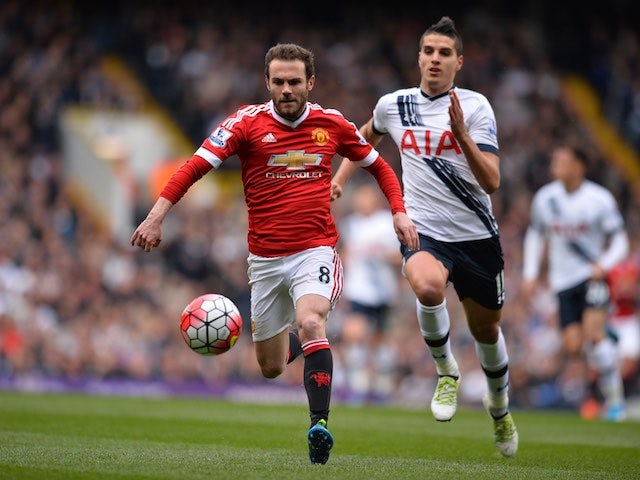 Juan Mata and Erik Lamela in action during the Premier League game between Tottenham Hotspur and Manchester United on April 10, 2016