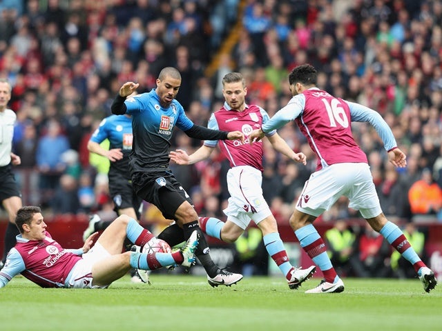 Lewis Grabban controls the ball during the Premier League match between Aston Villa and Bournemouth on April 9, 2016