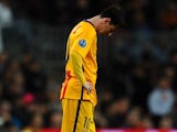 Lionel Messi reacts to Nando's goal during the Champions League quarter-final between Barcelona and Atletico Madrid on April 5, 2016