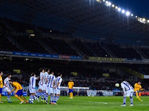 Lionel Messi takes a free kick during the La Liga game between Real Sociedad and Barcelona on April 9, 2016